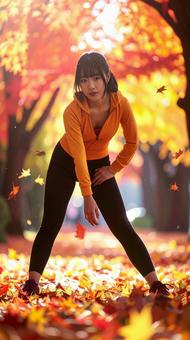 スポーツの秋 紅葉の中でストレッチ 女性 スポーツの秋 紅葉の中でストレッチ 女性の写真