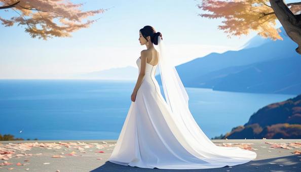 秋の紅葉の中のウェデイングドレス姿の花嫁 秋の紅葉の中のウェデイングドレス姿の花嫁の写真