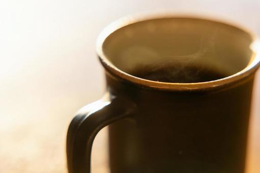 逆光にきらめく湯気 コーヒー,ホットコーヒー,珈琲の写真素材