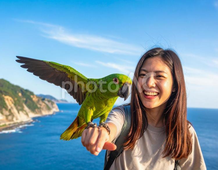 バケーション・南の島でインコと仲良し 女性,バケーション,海外旅行の写真素材
