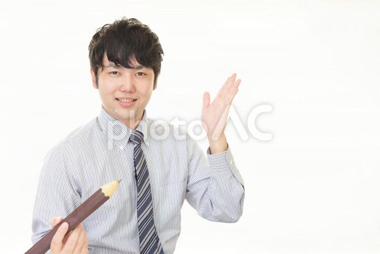 案内する笑顔のビジネスマン 男性,ビジネスマン,男の写真素材