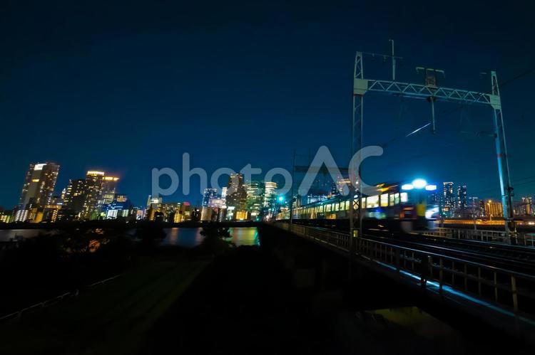 淀川を渡る電車 電車,橋,ビジネスの写真素材