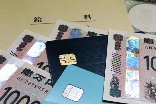 給料とクレジットカード カードローン,クレジットカード,現金の写真素材