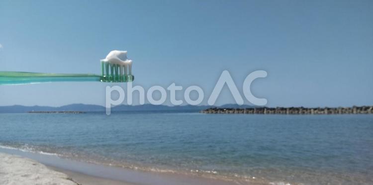 青い海で歯みがき 歯みがき,歯ブラシ,歯磨き粉の写真素材
