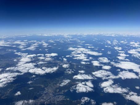 飛行機から見下ろす空と雲と日本列島﻿ 空,雲,青空の写真素材