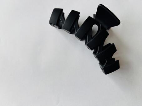 黒いヘアクリップ、コピースペース ヘアクリップ,クリップ,ヘアアクセサリーの写真素材