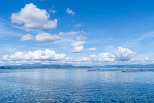 快晴の鹿児島湾 海,青空,雲の写真素材