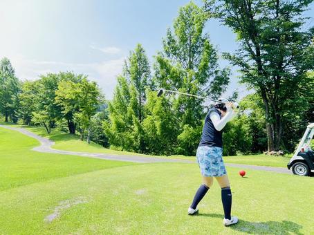 ゴルフスイング中の女性プレーヤー ゴルフ,女性,ゴルファーの写真素材