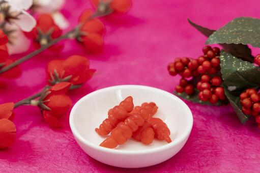 ちょろぎと梅の花・華やかなお正月飾り ちょろぎ,梅,南天の写真素材
