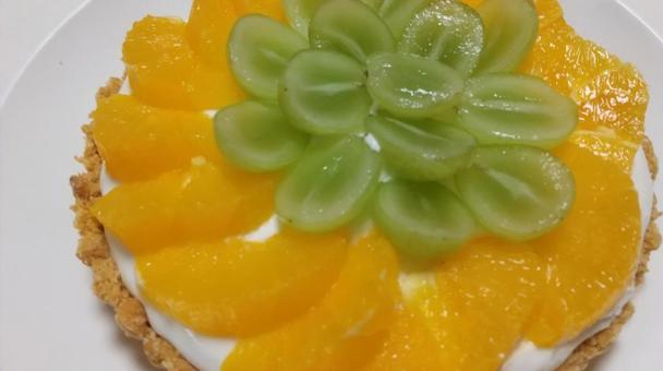 マスカットとオレンジのタルトケーキ マスカットとオレンジのタルトケーキの写真