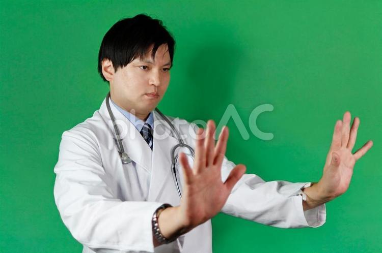 警告する医師の姿 医師,警告,白衣の写真素材