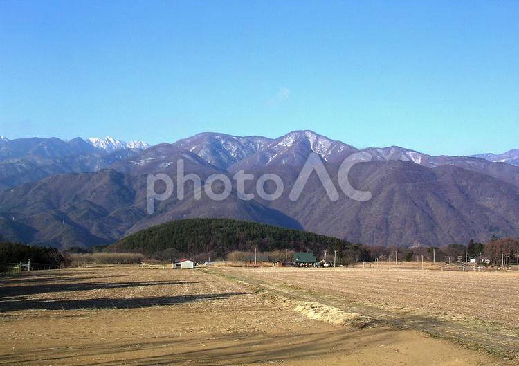 早春の南アルプスと田園風景 早春,南アルプス,田園風景の写真素材