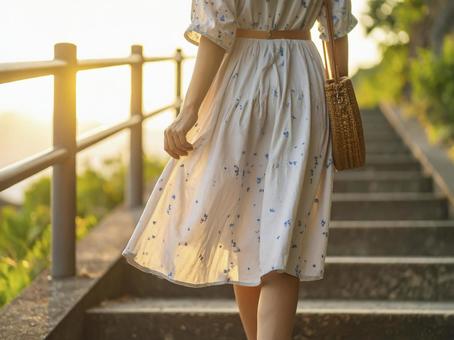 階段を上がる若い女性の後ろ姿 生成AI 階段を上がる若い女性の後ろ姿 生成AIの写真