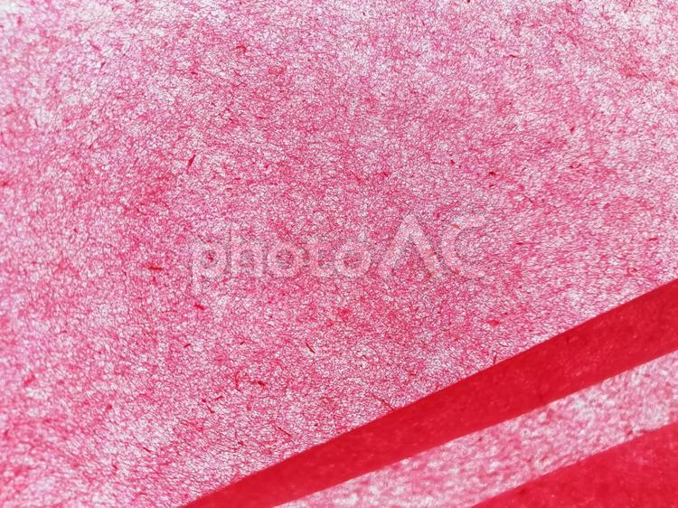 和紙　ざらざら赤色(右下ライン) 和紙,紙,背景の写真素材