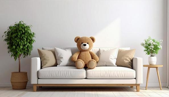 ソファーに座るくまのぬいぐるみ ソファーに座るくまのぬいぐるみの写真