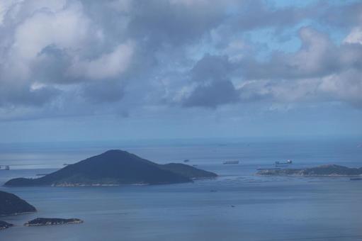 香港の山からの海と島と船舶と空の風景 香港,山,海の写真素材