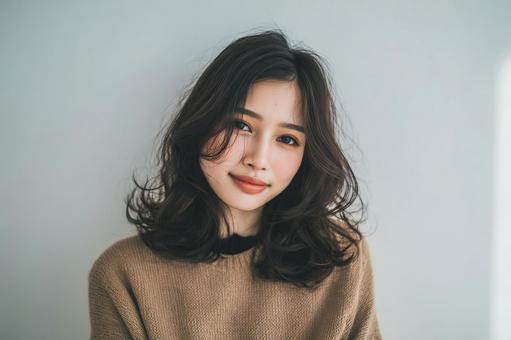 パーマヘアが美しい女性、ヘアサロンモデル パーマヘアが美しい女性、ヘアサロンモデルの写真