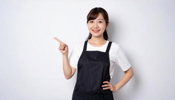 指差しをしている30代の女性 指差しをしている30代の女性の写真