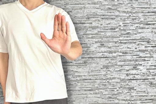 手を上げてストップをかける男性(顔無し) 手を上げてストップをかける男性(顔無し) ストップ,禁止,男性の写真素材