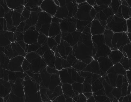 水面の光と陰の模様 水面の光と陰の模様の写真