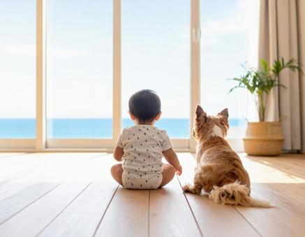 家から海を眺める赤ちゃんと犬の後ろ姿 家から海を眺める赤ちゃんと犬の後ろ姿の写真