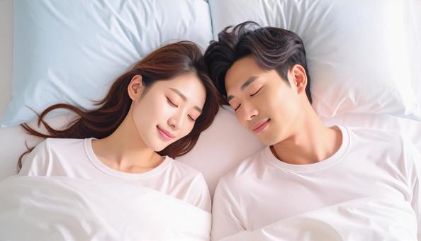 眠る夫婦 眠る夫婦の写真