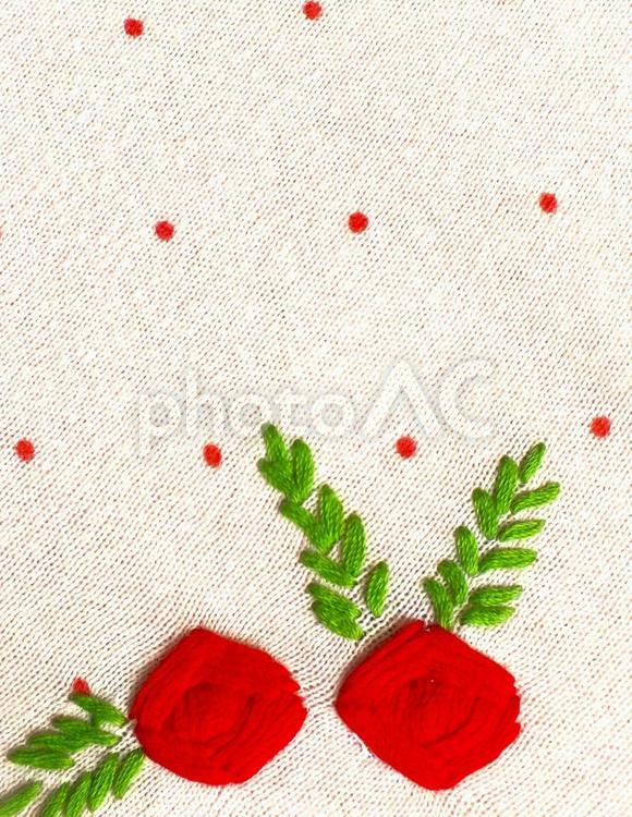 花の刺繍の模様とニット地 刺繍,花,赤い花の写真素材