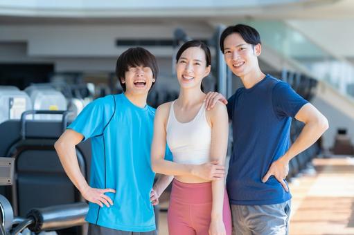 スポーツジムでトレーニングをする若い男女 スポーツジム,フィットネス,ダイエットの写真素材