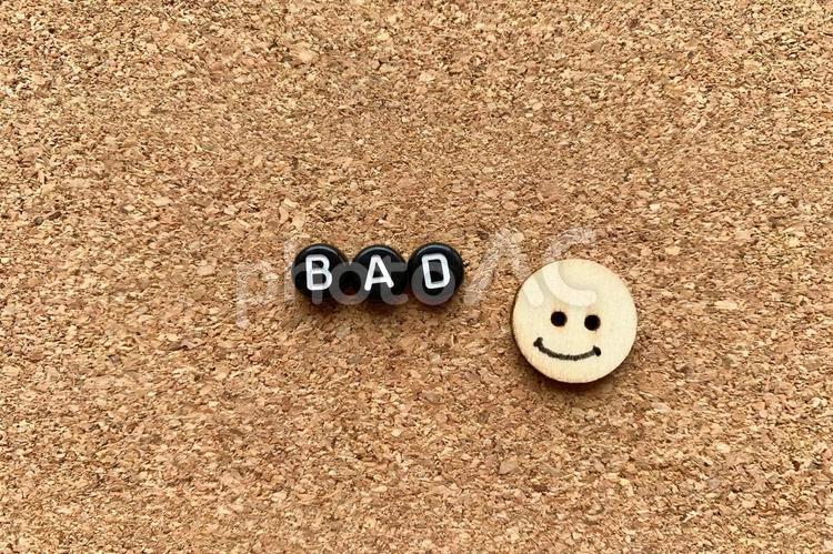 BADの文字とフェイスボタン バッド,悪い,最悪の写真素材