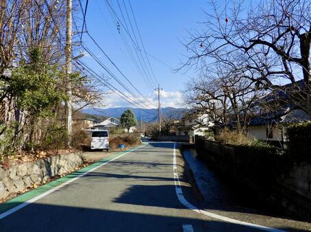 山梨県甲州市西藤木のセギのある道 田舎,農村,集落の写真素材