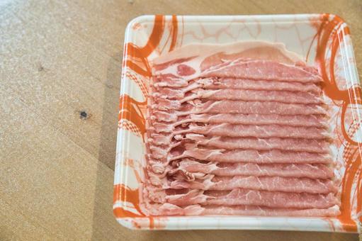 パックに入った豚肉・ロース 鍋料理,食事,夕食の写真素材