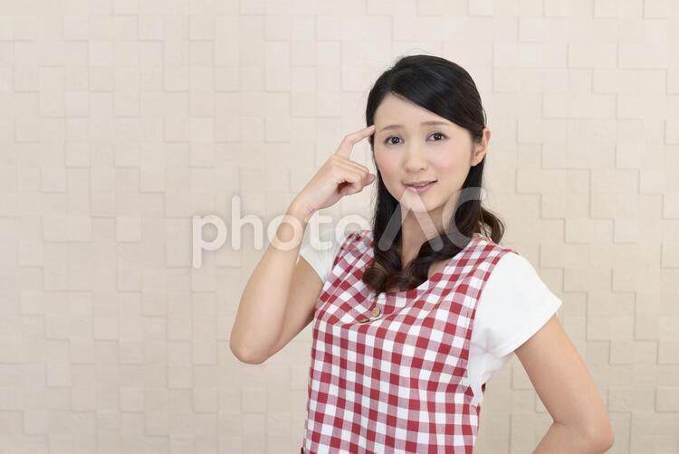 困惑した表情の女性 女性,主婦,母親の写真素材