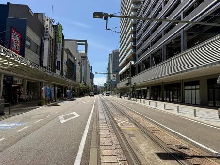 夏の福井駅前のビル街 福井駅,福井県,街並みの写真素材