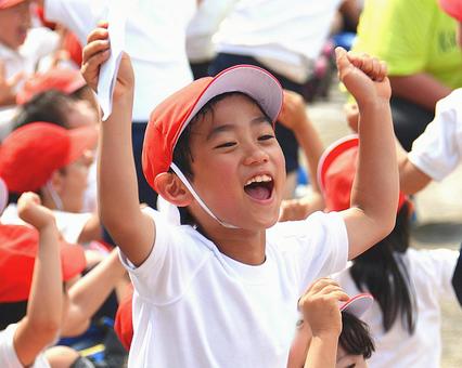 A boy who plays guts at the athletic meet, sports day, children, guts pose, JPG