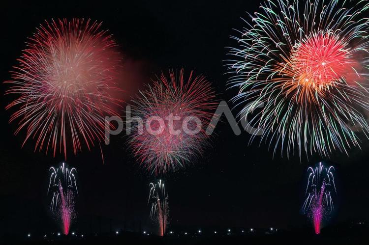 ちっちゃな花火大会　合成　4 花火,打上花火,夜景の写真素材