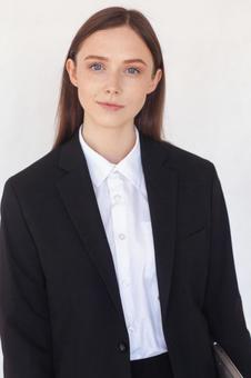 カメラ目線のスーツ女性 女性,外国人,ビジネスの写真素材