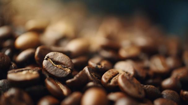 焙煎されたコーヒー豆のクローズアップ 焙煎されたコーヒー豆のクローズアップの写真