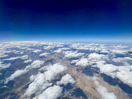 飛行機から眺める天空のパノラマ 飛行機から眺める天空のパノラマ 飛行機,空,雲雲海の写真素材