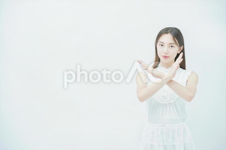 ストレスを抱えた表情をする若い女性 女性,失敗,顔の写真素材