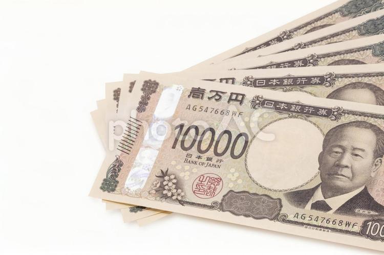 5枚の新一万円札のクローズアップ 新紙幣,五万円,一万円札の写真素材
