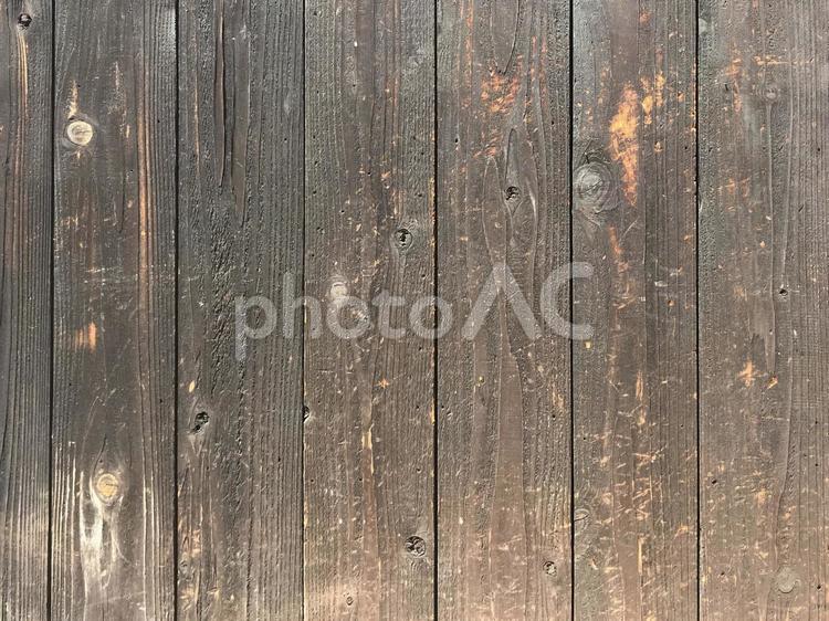木目素材　板壁　こげ茶色 木目,テクスチャ,背景の写真素材