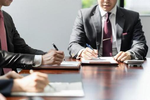 A businessman having a meeting in a bright conference room, meeting, businessman, conference room, JPG