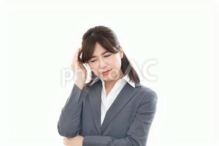 ビジネスウーマン　ネガティブ　頭痛 女性,風邪,頭痛の写真素材