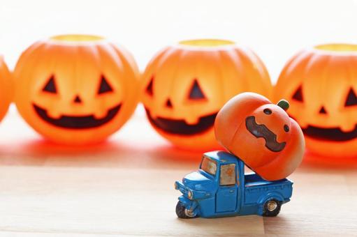 ハロウィンのカボチャを配ってまわります ハロウィンのカボチャを配ってまわります ハロウィン,プレゼント,カボチャの写真素材