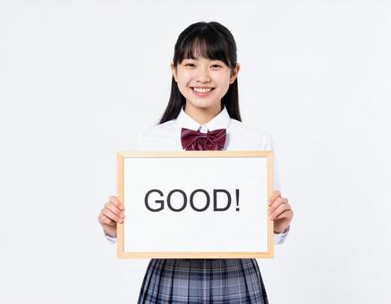 Goodと書いたボードを持つ女子生徒 Goodと書いたボードを持つ女子生徒の写真