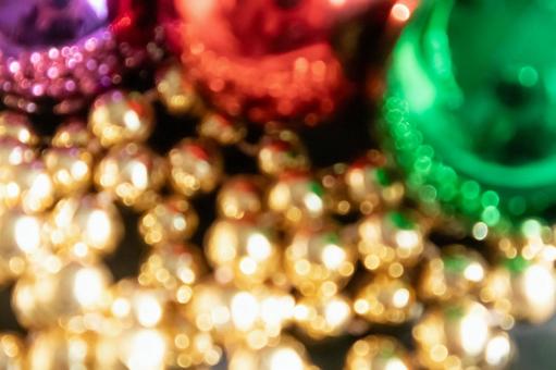 クリスマスオーナメントのボケ背景 キラキラ,イルミネーション,金色の写真素材