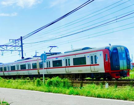 青空の下を走る名鉄電車 名鉄,電車,線路の写真素材