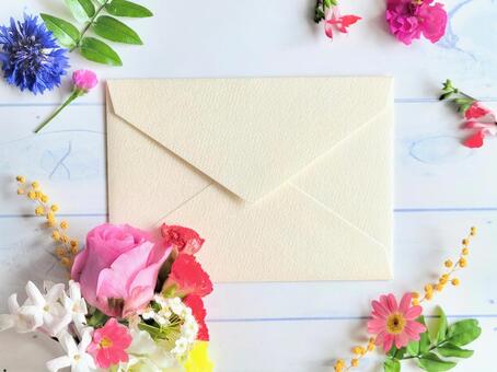 封筒とカラフルなお花 母の日,花,手紙の写真素材