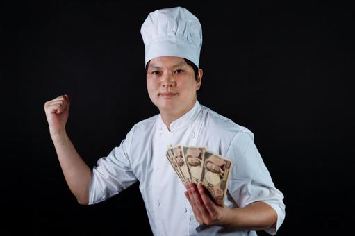 笑顔のシェフとお金 笑顔のシェフとお金の写真