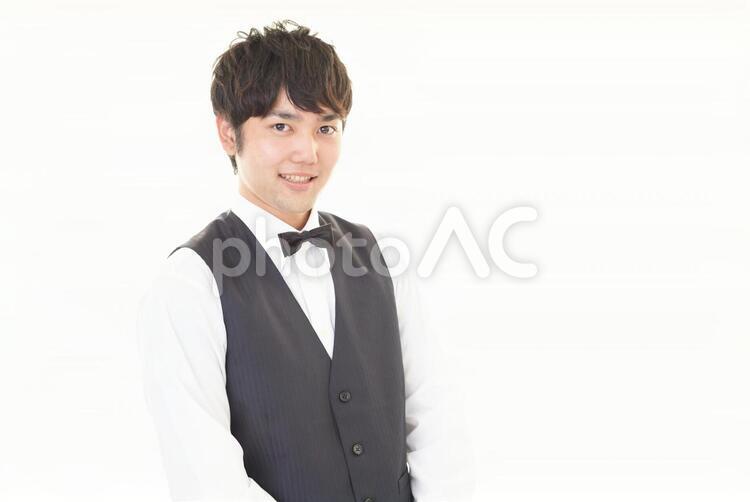 微笑むウェイター 男性,ウェイター,男の写真素材